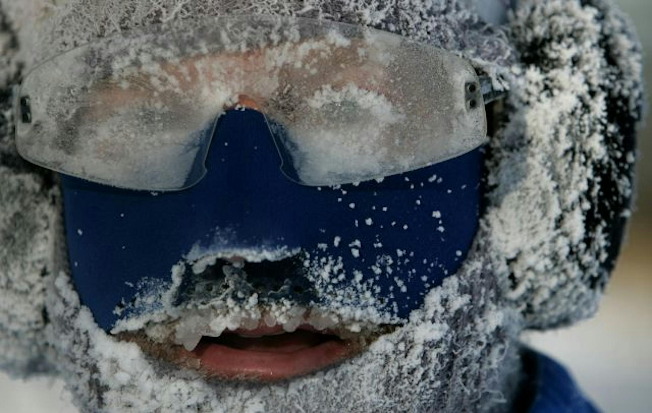 Brave runner Keith Golke of Minneapolis resembles an icecicle while jogging around Lake Calhoun Tuesday morning on the coldest day in Minnesota since 2004. While Golke admitted it was cold, "this is nothing," he said. "My record is 25 below zero." An Arctic blast has descended on much of the midwest causing temps to plummet with record breaking lows approaching minus 40 degrees in parts of North Dakota.