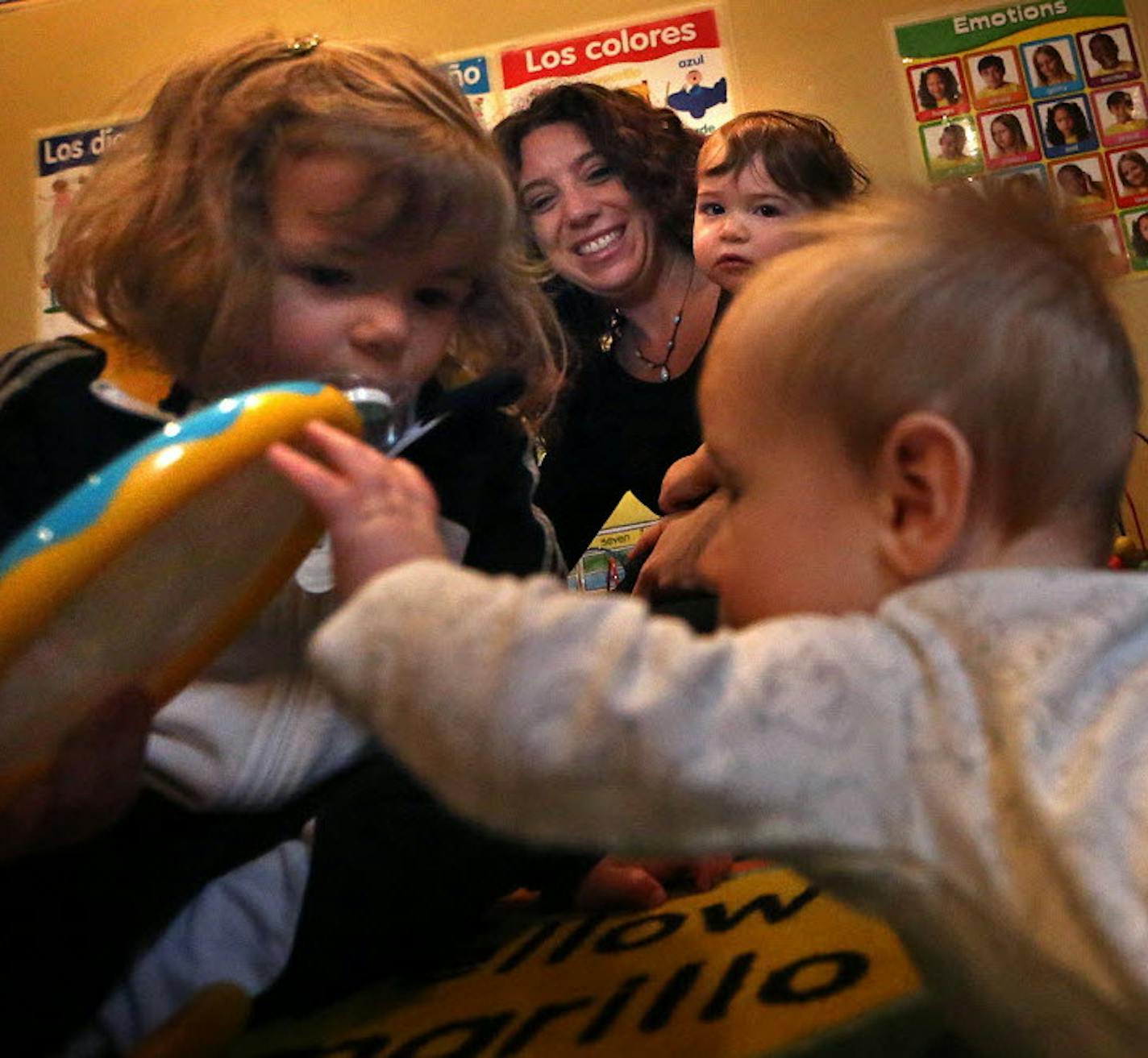 Luciana Carballo-Pierre kept a close eye on children in her care at her "Parent Aware" four-star rated day care in Minneapolis in 2015. The pre-school kids, in addition to play, learn about colors, letters and numbers. Star Tribune file photo