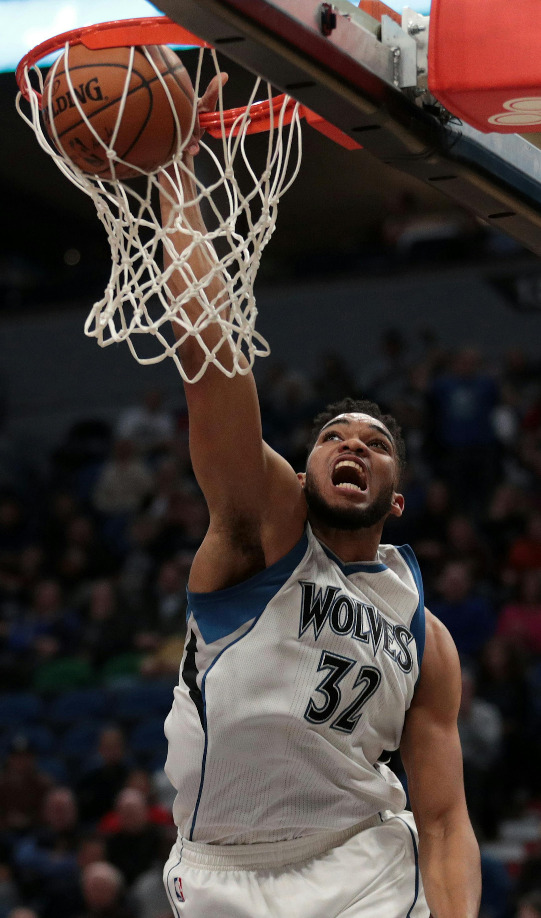 Minnesota Timberwolves center Karl-Anthony Towns (32) dunks the ball in the first half. ] ANTHONY SOUFFLE &#x2022; anthony.souffle@startribune.com The Minnesota Timberwolves played the Houston Rockets during an NBA game Saturday, Dec. 17, 2016 at the Target Center in Minneapolis.