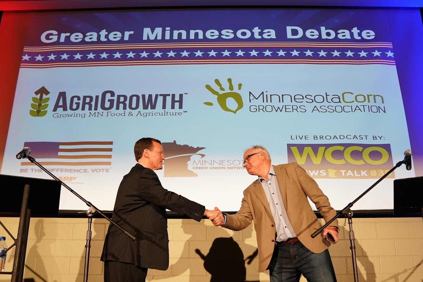 Minnesota gubernatorial candidates Republican Jeff Johnson, left, shook hands with with DFLer Tim Walz after the "Greater Minnesota Debate" in Willmar, Minn., on Tuesday night.