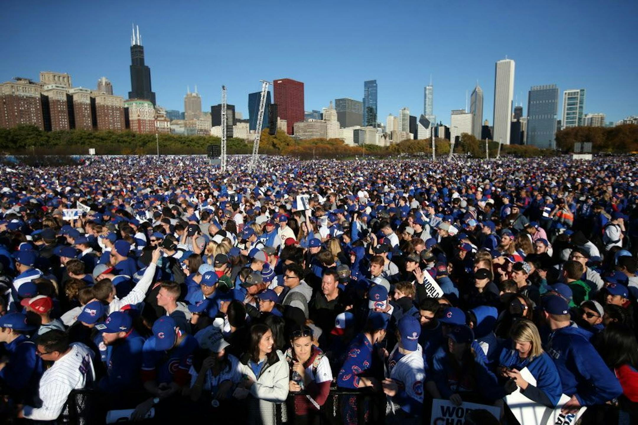 Fans pack into Grant Park before 10 a.m. on Friday, Nov. 4, 2016 as the Chicago Cubs celebrate their World Series championship with a rally in Chicago.