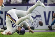 Minnesota Vikings quarterback Nick Mullens (12) was pressured by the Lions defense in the second quarter at U.S. Bank Stadium in Minneapolis on Sunday