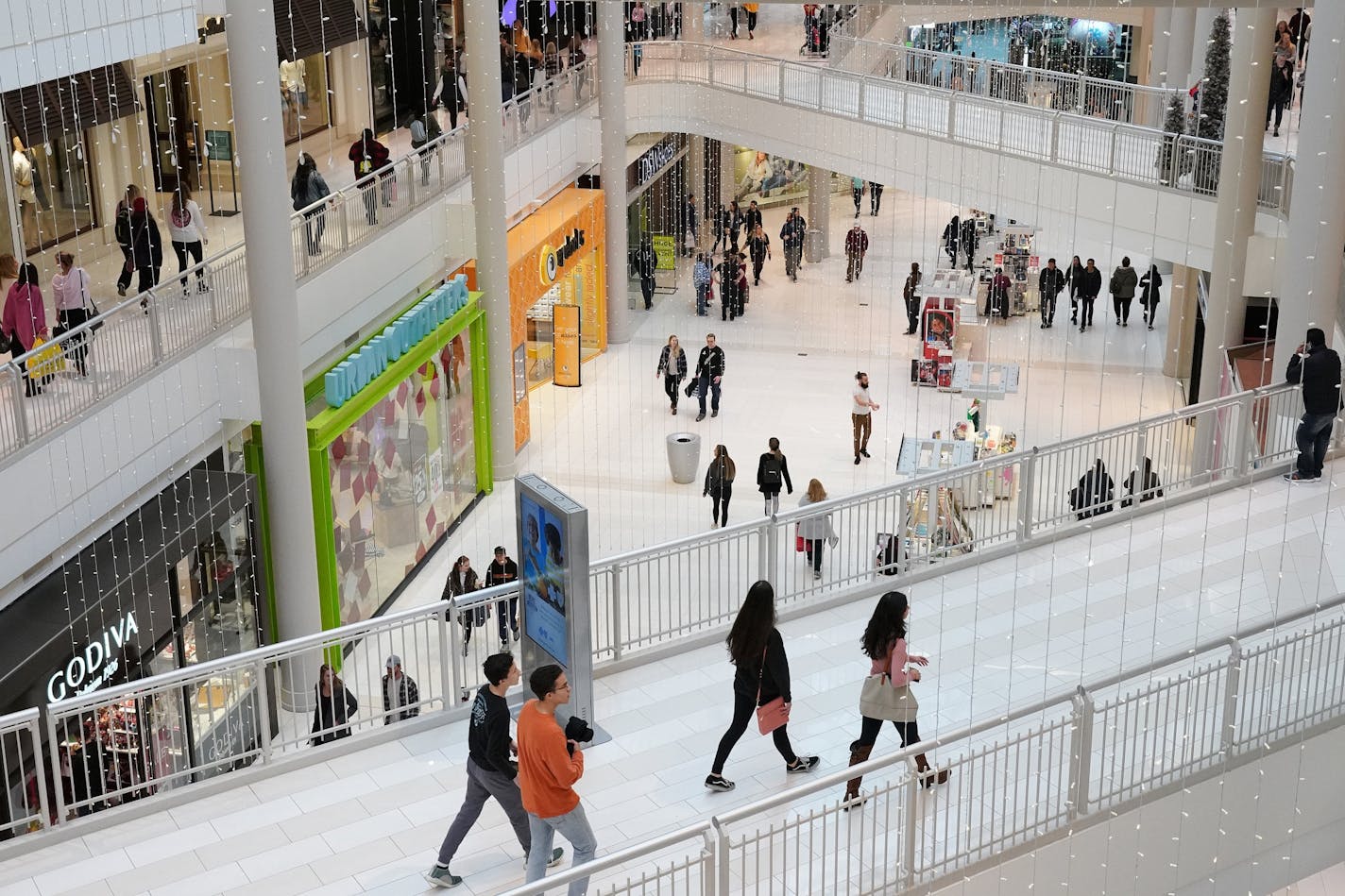 Shoppers and returners filled the Mall of America the day after Christmas to catch late season deals and return all those unwanted gifts Wednesday at the Mall of America.