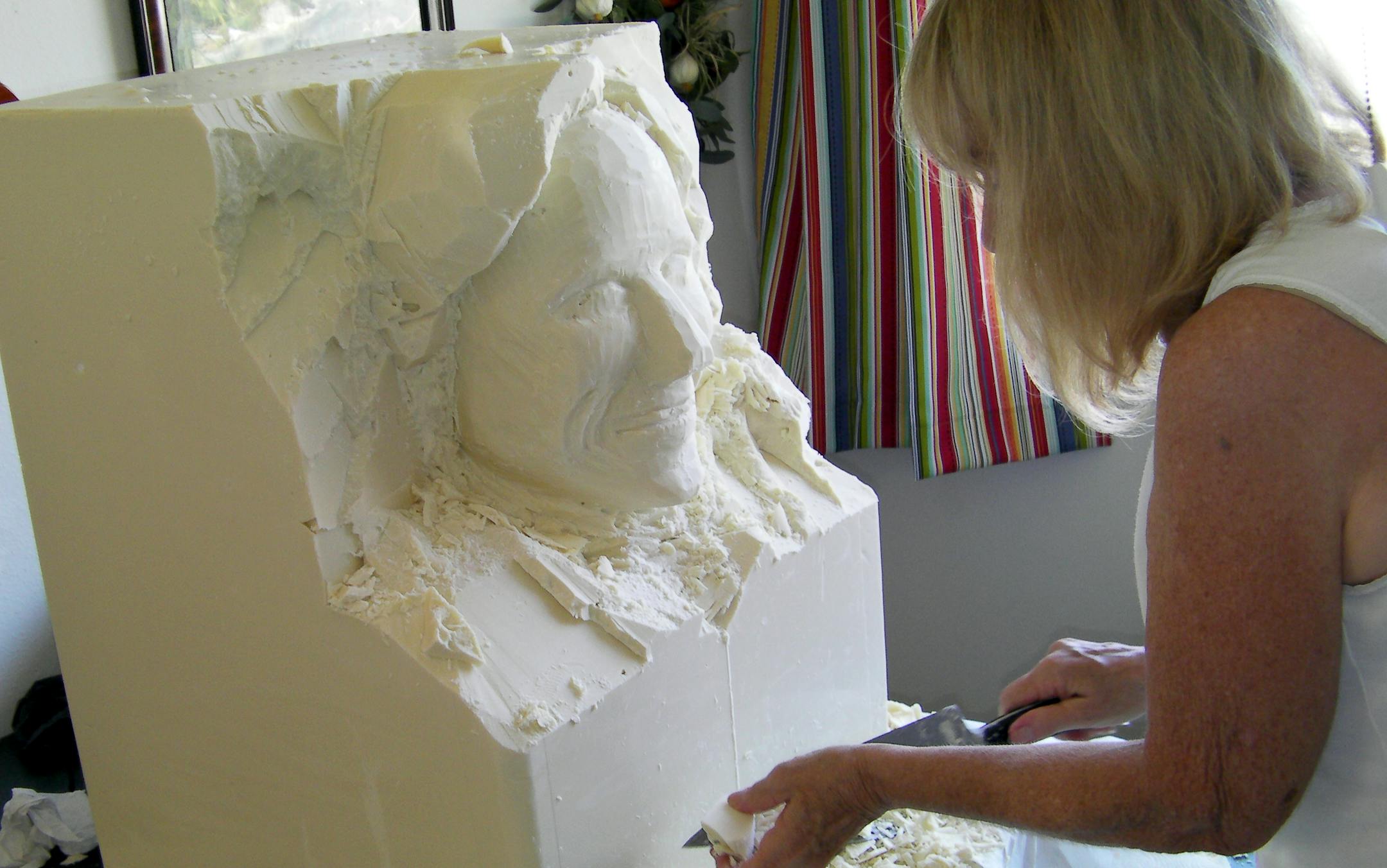 State Fair butter carver Linda Christensen carves a bust of TV talk show host Conan O'Brien from a block of white chocolate. The bust presented on Wednesday night's show was a give from the people at No Name Premium Meats of St. Michael.