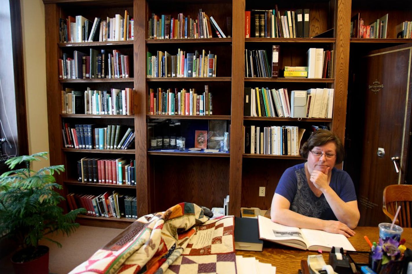 Cindy Thury Smith manned the Pioneer Room at the Hastings City Hall, Monday, January 23, 2012. Smith was one of the few city paid historians in Minnesota. Since 2002, she worked 20 hours a week in Hasting's Pioneer Room in City Hall, the former county courthouse. But the era of tight budgets hit in 2012,and her position was axed. That didn't stop Smith,who still shows up two days a week to field history questions and keep the historian tradition alive. She's coauthored a book on Civil War vetera