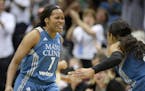 Minnesota Lynx guard Jia Perkins (7) and forward Maya Moore (23) celebrated a 3-pointer by Perkins in the fourth quarter Tuesday. ] (AARON LAVINSKY/ST
