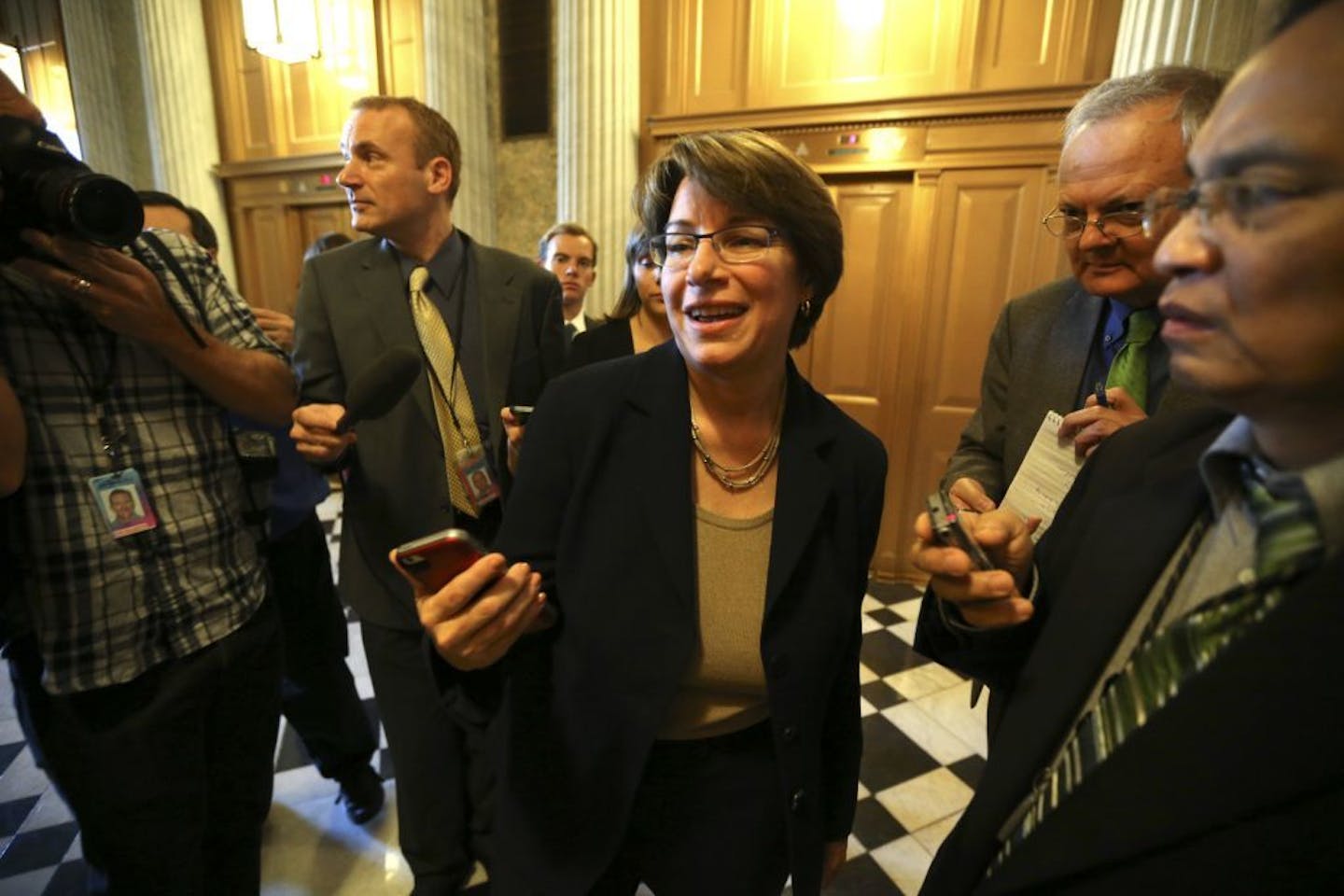 Sen. Amy Klobuchar (D-Minn.) leaves a meeting with Senate Democratic leaders on Capitol Hill in Washington, Oct. 14, 2013. President Barack Obama said Monday there had been "some progress" in the Senate toward a deal that could avert a breach of the nation's debt limit, but expressed skepticism noting that any deal reached in the Senate would have to be agreed upon by the House, where Republicans are in charge.