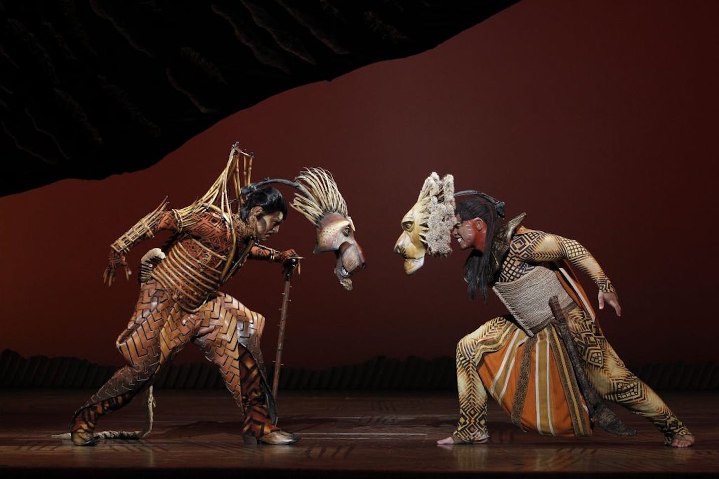 J. Anthony Crane as Scar, left, and Dionne Randolph as Mufasa in "The Lion King." Crane has Twin Cities family connections.