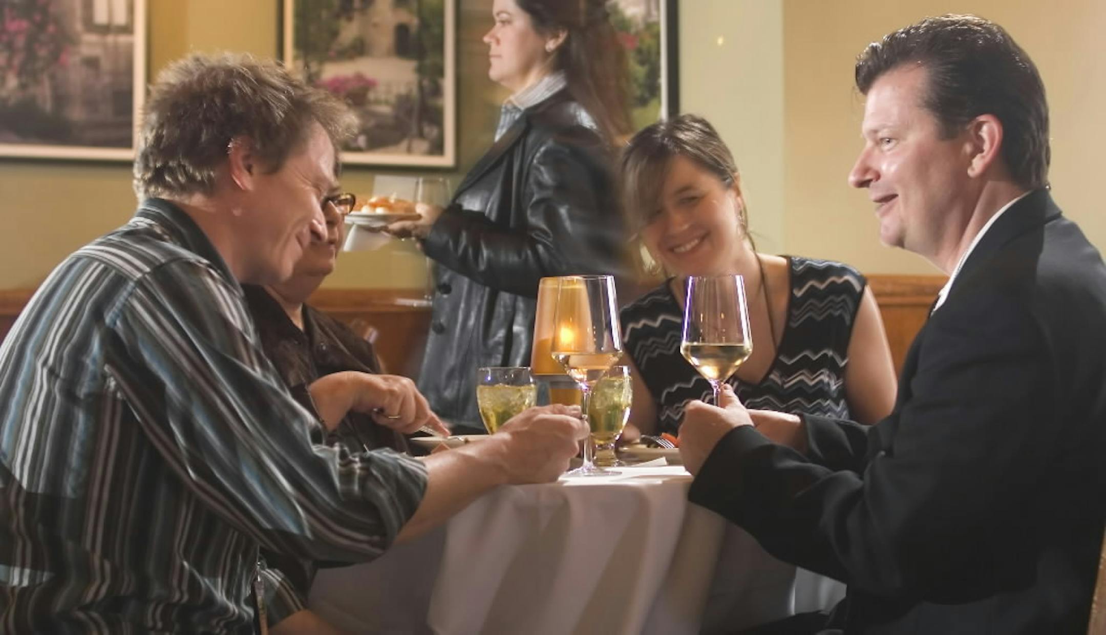 Paul and Trina Wentzel (left, & 3rd from left) and Martha and Paul Claesgens (2nd from left and right) sampled the food along with the wine at a Sample event in 2007.