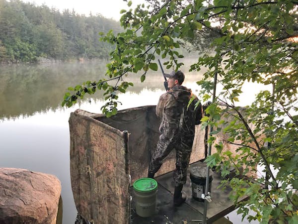 Harrison Smith of Willmar watched for ducks in the Minnesota River Valley on the 2022 duck opener.
