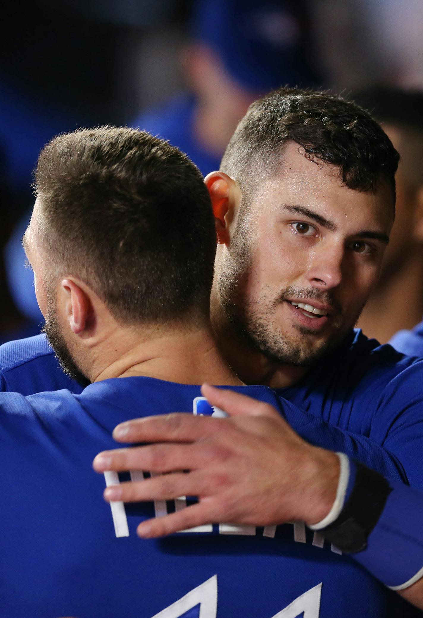 Blue Jays Luke Maile hugged teammate Kevin Pillar after scoring on a wild pitch in the 10th inning at Target Field Tuesday May 1, 2018. ] The Minnesota Twins hosted the Toronto Blue Jays at Target Field. JERRY HOLT &#xef; jerry.holt@startribune.com