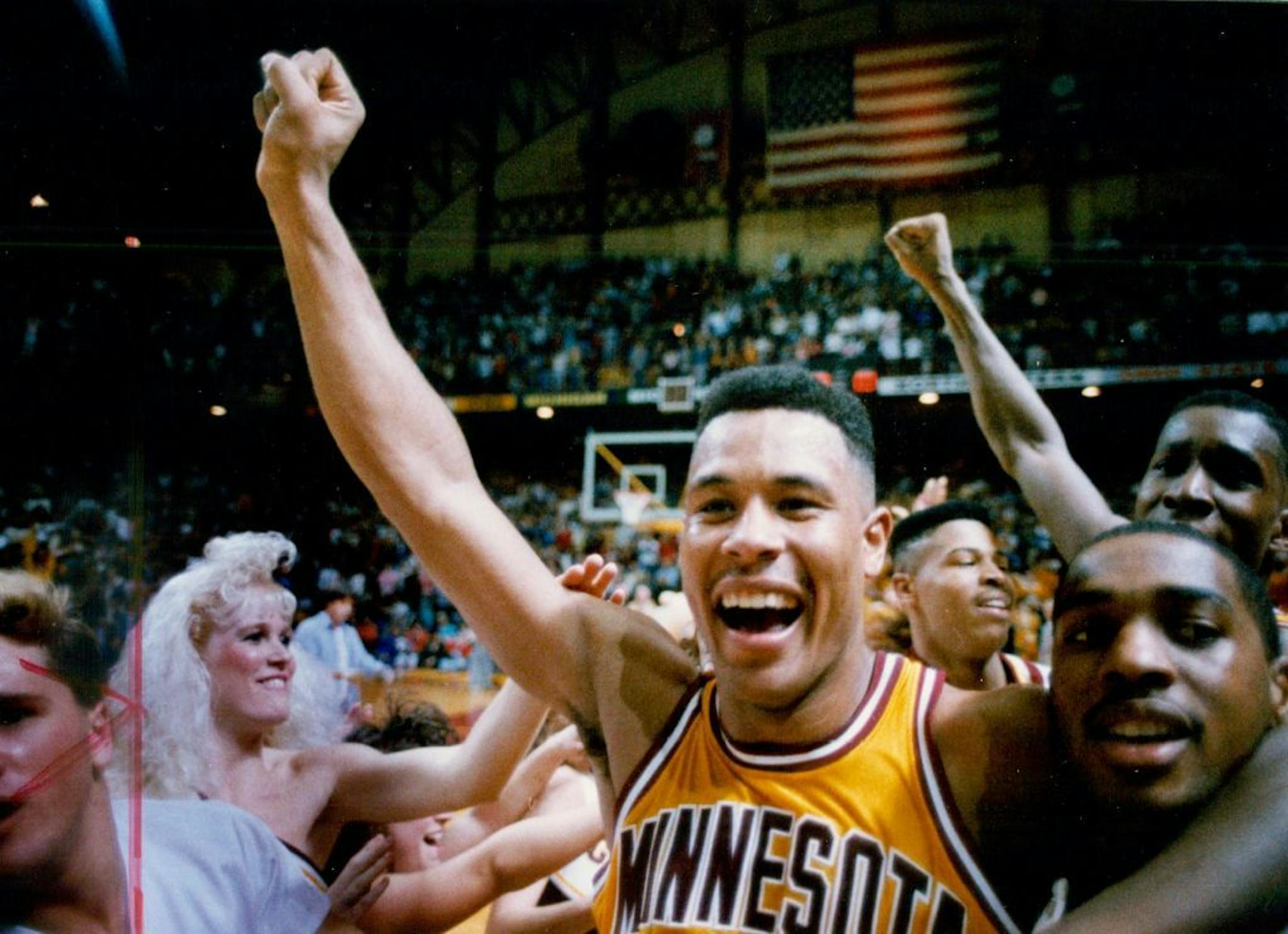 Gophers forward Richard Coffey celebrated with the rest of his teammates after an upset victory over Illinois at a raucous Williams Arena in January 1989. His son Amir is a key member of the current team.