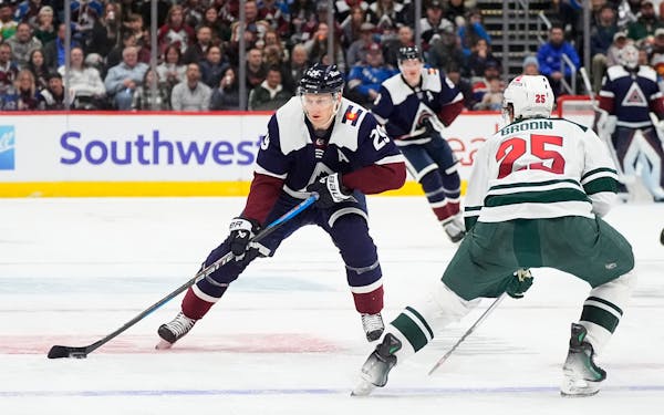 Avalanche center Nathan MacKinnon was tied with Tampa Bay's Nikita Kucherov for the NHL scoring lead with 127 points before Wednesday's games.
