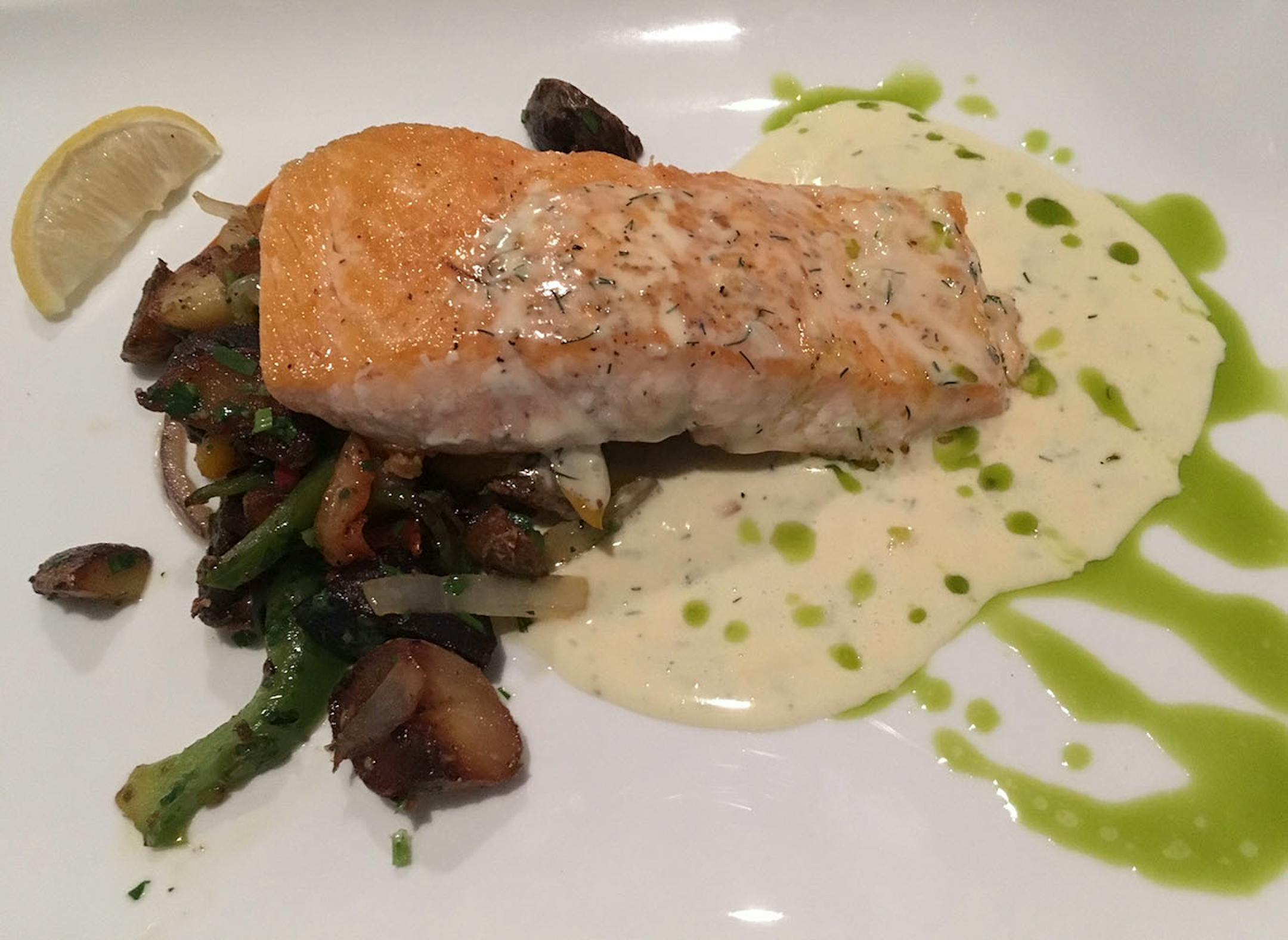Salmon with lemon-dill butter at Cahill Bistro in Edina.