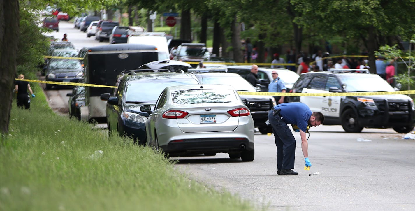 Minneapolis Police investigated the scene of a shooting Monday afternoon. ] Mark Vancleave - mark.vancleave@startribune.com * A shooing left one man dead and two hospitalized on the 2700 block of 3rd St. North on Monday, May 25, 2015 in Minneapolis.