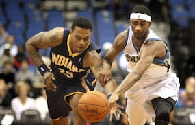 Brandon Rush, left, in a 2010 preseason game against the Wolves when he played for Indiana.