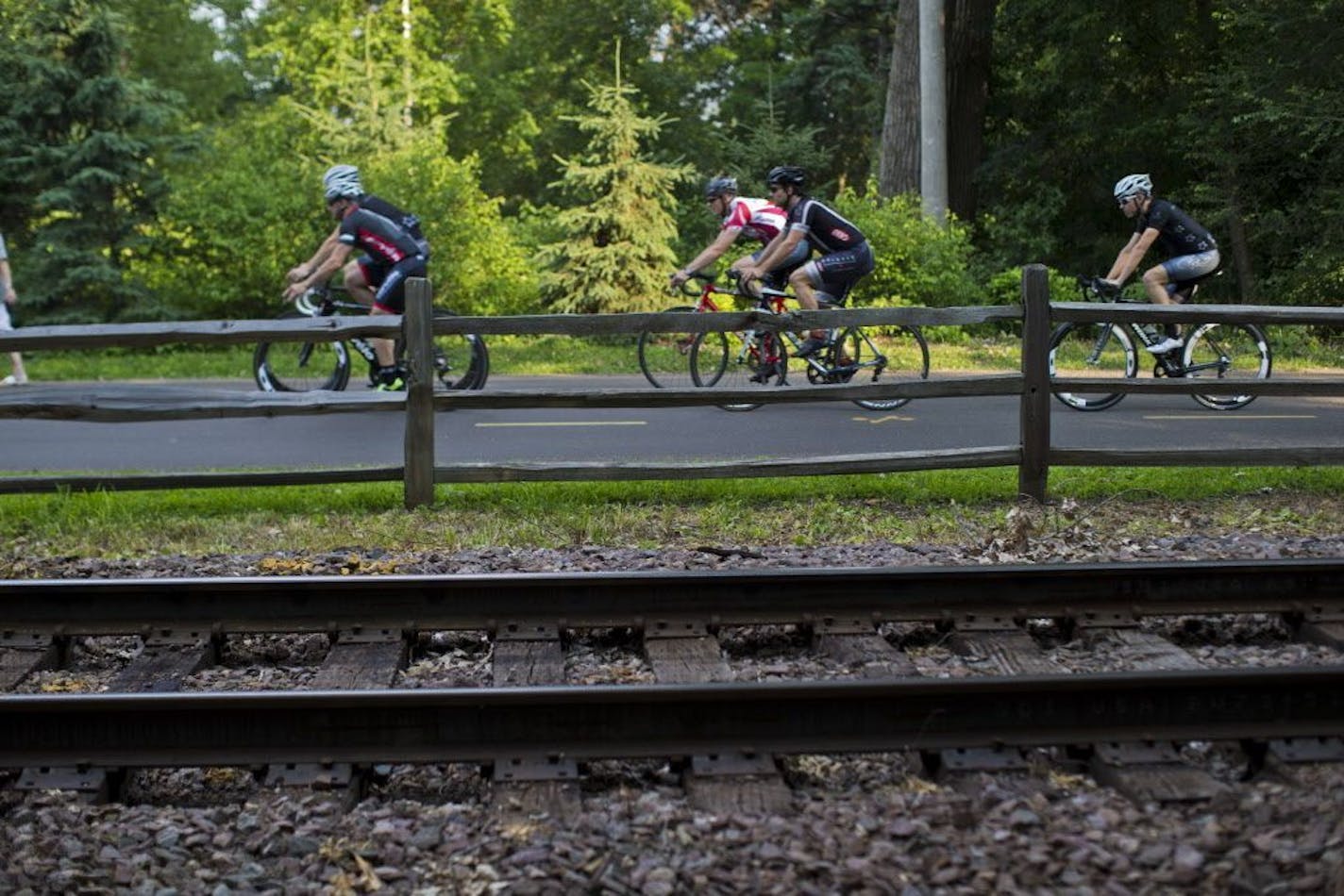 The Kenilworth Trail alongside a current freight train track that has been a proposed route for the Southwest Corridor light-rail line.