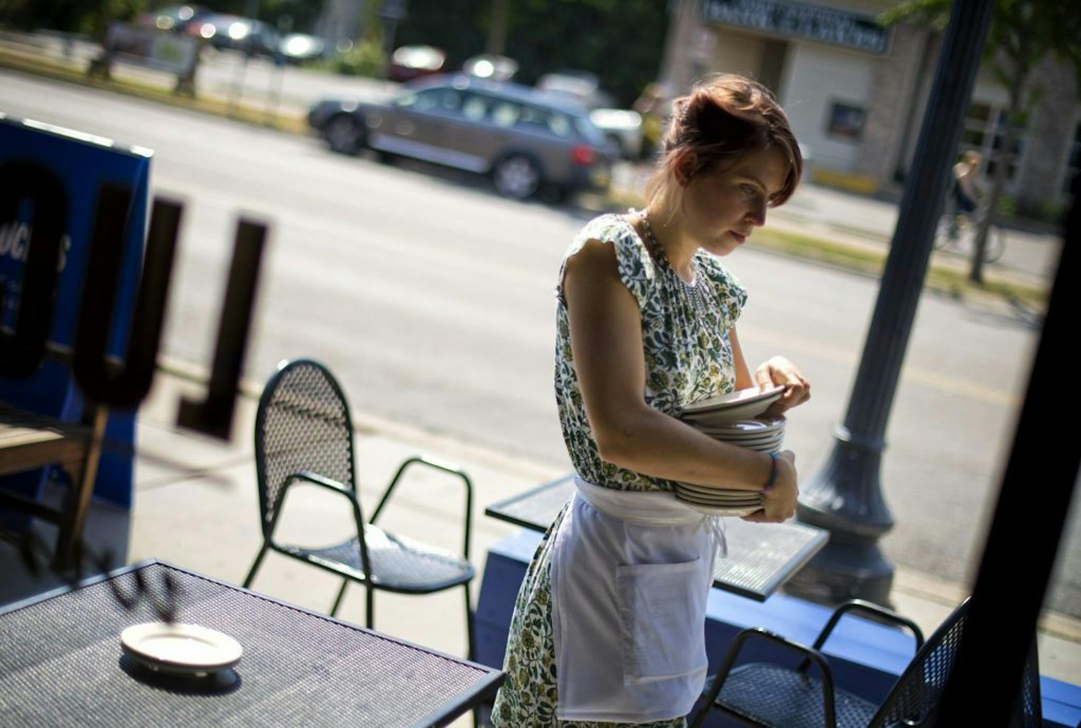 Colleen Harriss, 27, lives in north Minneapolis and waits tables at Lucia's Restaurant in Uptown. After graduating from college with a degree in art history, she tried to build a career in the art world but gave up after a couple years of part-time work at a non-profit gallery. She's happy to work part-time Wednesday, August 28, 2013