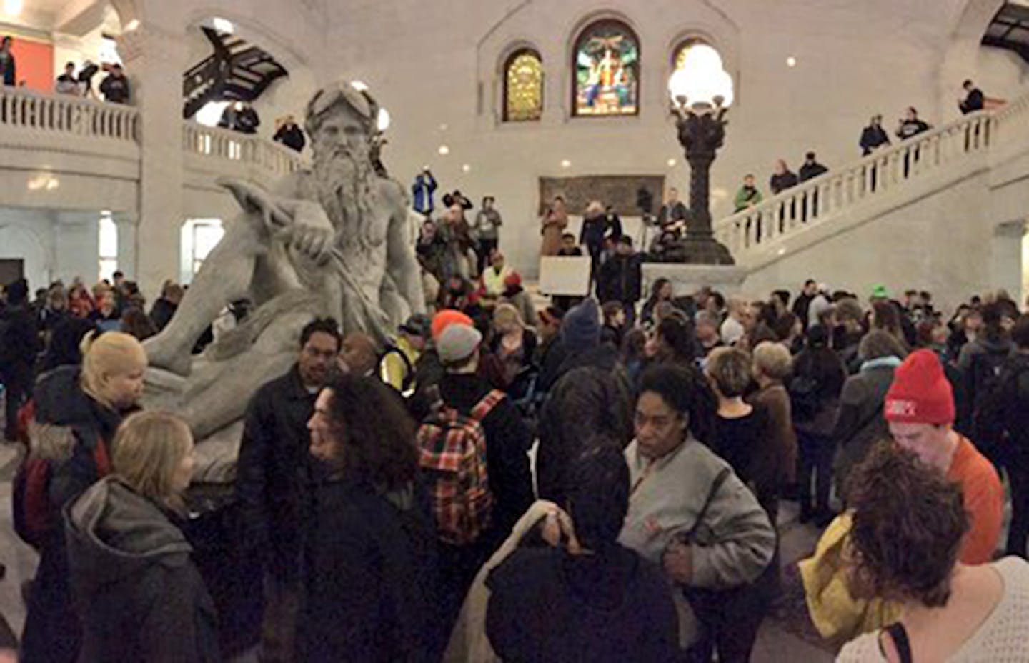 Protesters gather inside City Hall on Thursday, less than a day after an encampment outside the Fourth Precinct was cleared by Minneapolis police.