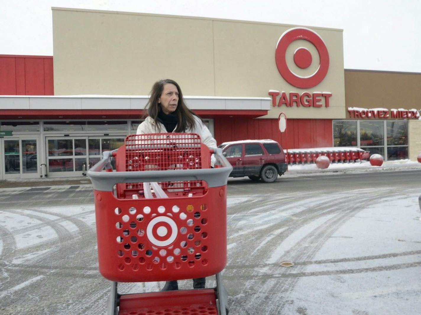 Joanne Coulombe leaves a Target store in Saint-Eustache, Quebec, on Thursday, Jan. 15, 2015.