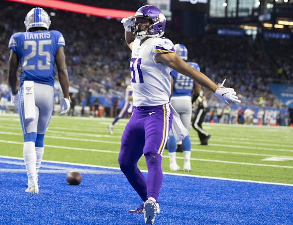 Minnesota Vikings wide receiver Bisi Johnson (81) celebrated his 2nd quarter touchdown at Ford Field.