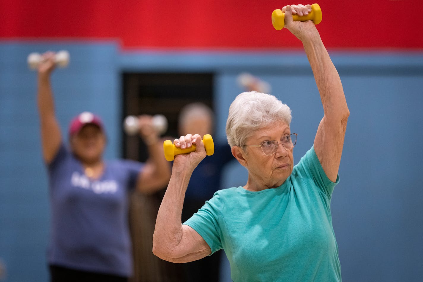 Sue Nightingale works out during the Fit &amp; Fabulous exercise class held by Keystone Community Services at the West 7th Community Center in St. Paul, Minn. on Monday, Sept. 18, 2023. ] LEILA NAVIDI • leila.navidi@startribune.com