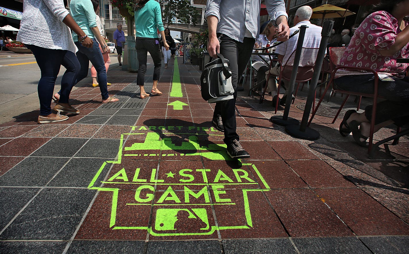 A green painted line with some informational markings runs through a portion of downtown (here along Nicollet Mall) between the Minneapolis Convention Center, site of All-Star FanFest, and Target Field (according to information posted on the MLB web site). ] JIM GEHRZ &#x201a;&#xc4;&#xa2; jgehrz@startribune.com / Shakopee, MN / July 10, 2014 / 1:00 PM