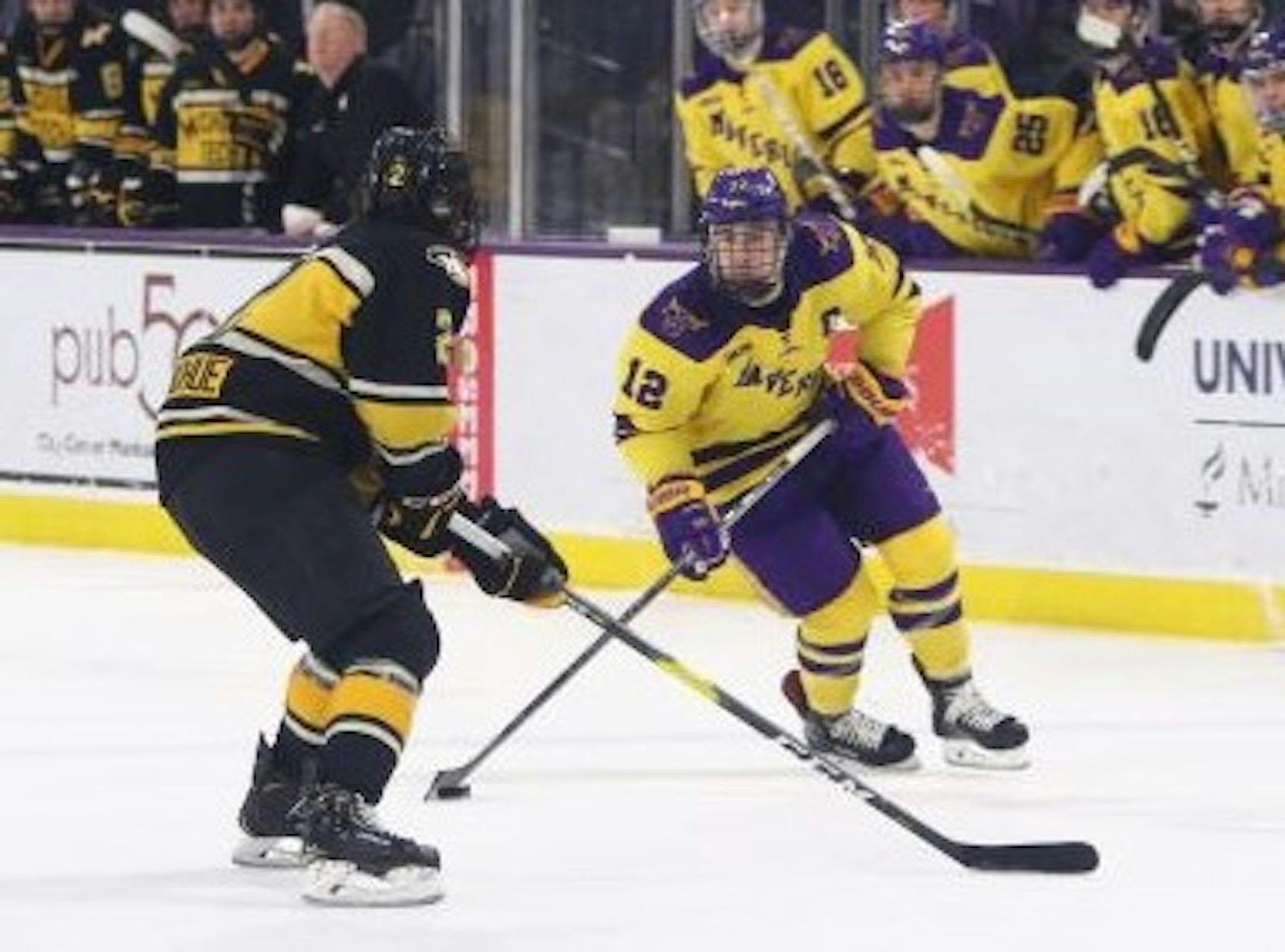 Minnesota State's Max Coatta, right.