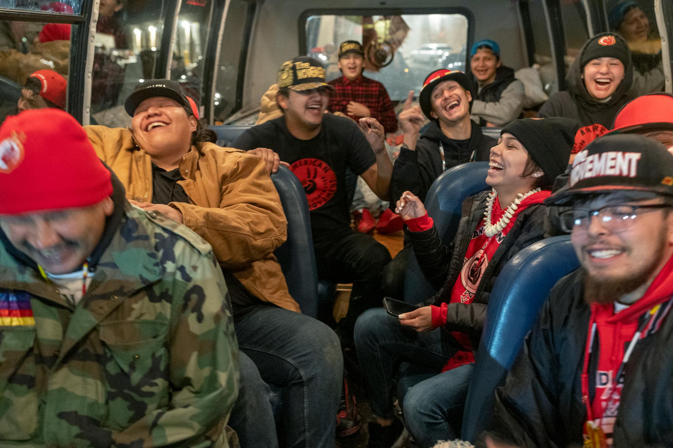 American Indian Movement youth members from Rapid City hang out in the bus they use to help the homeless while they help at the Pow Wow to honor the AIM Warriors of Wounded Knee of 1973 in Wanblee, SD on the Pine Ridge Indian Reservation.