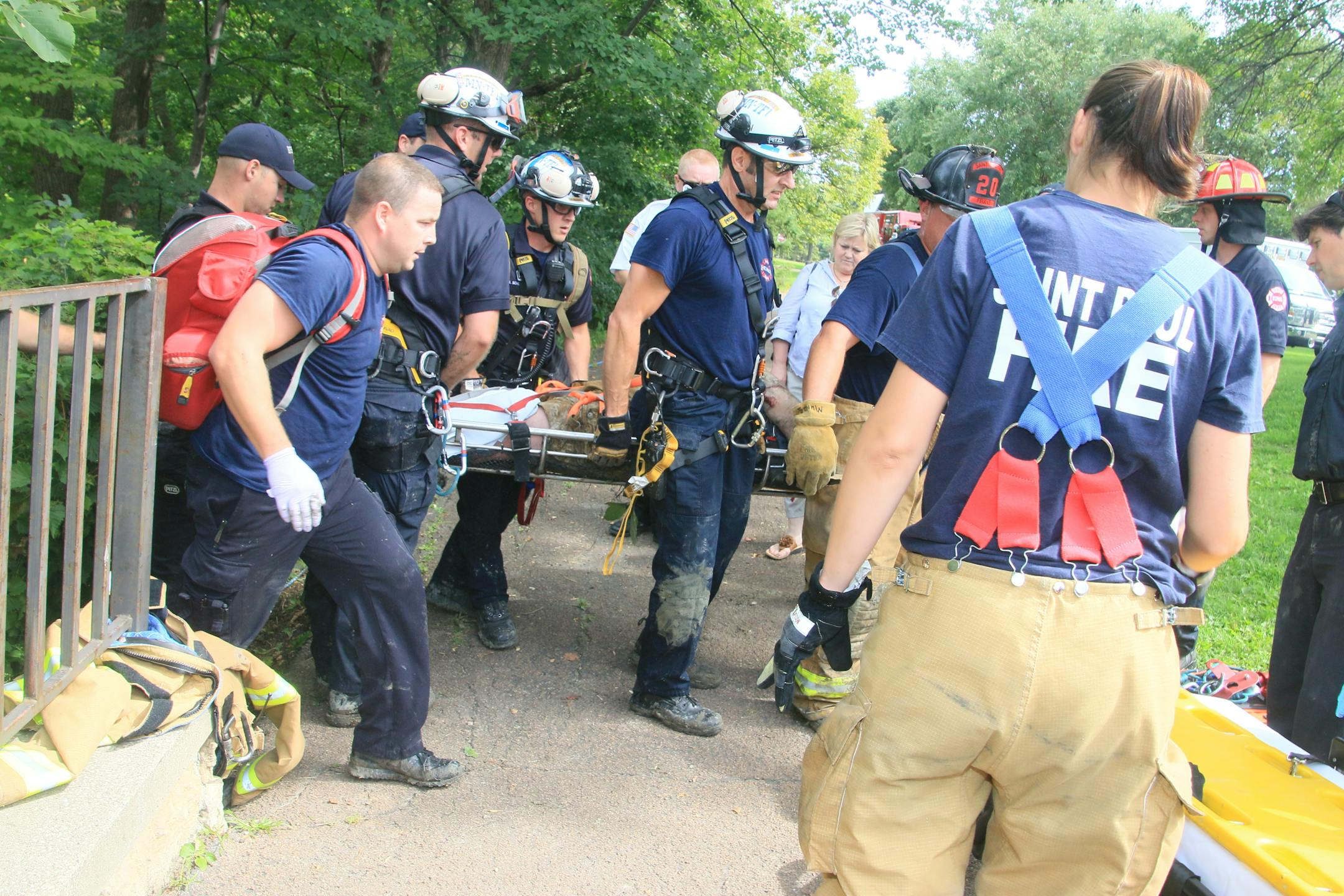 St. Paul Fire Department personnel hoisted the hiker up in a basket to the top of the bluff near Mississippi River Boulevard and Summit Avenue about 1:30 p.m. Saturday.