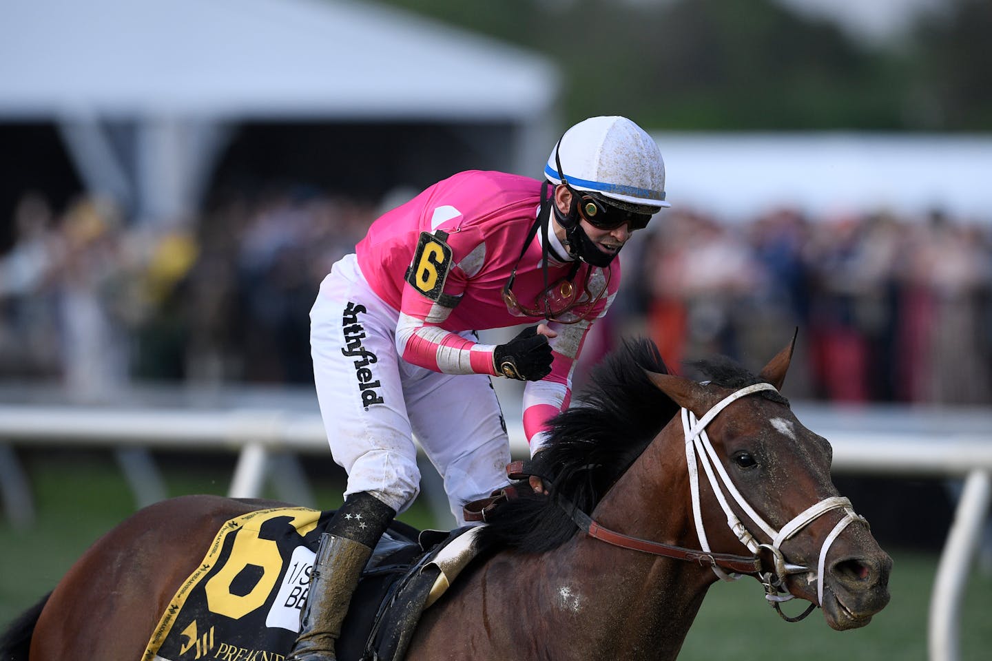 Flavien Prat atop Rombauer reacts after winning the Preakness Stakes horse race at Pimlico Race Course, Saturday, May 15, 2021, in Baltimore. (AP Photo/Nick Wass)