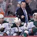 Wild interim coach John Torchetti gave instructions on the bench during his debut Monday night at Vancouver.