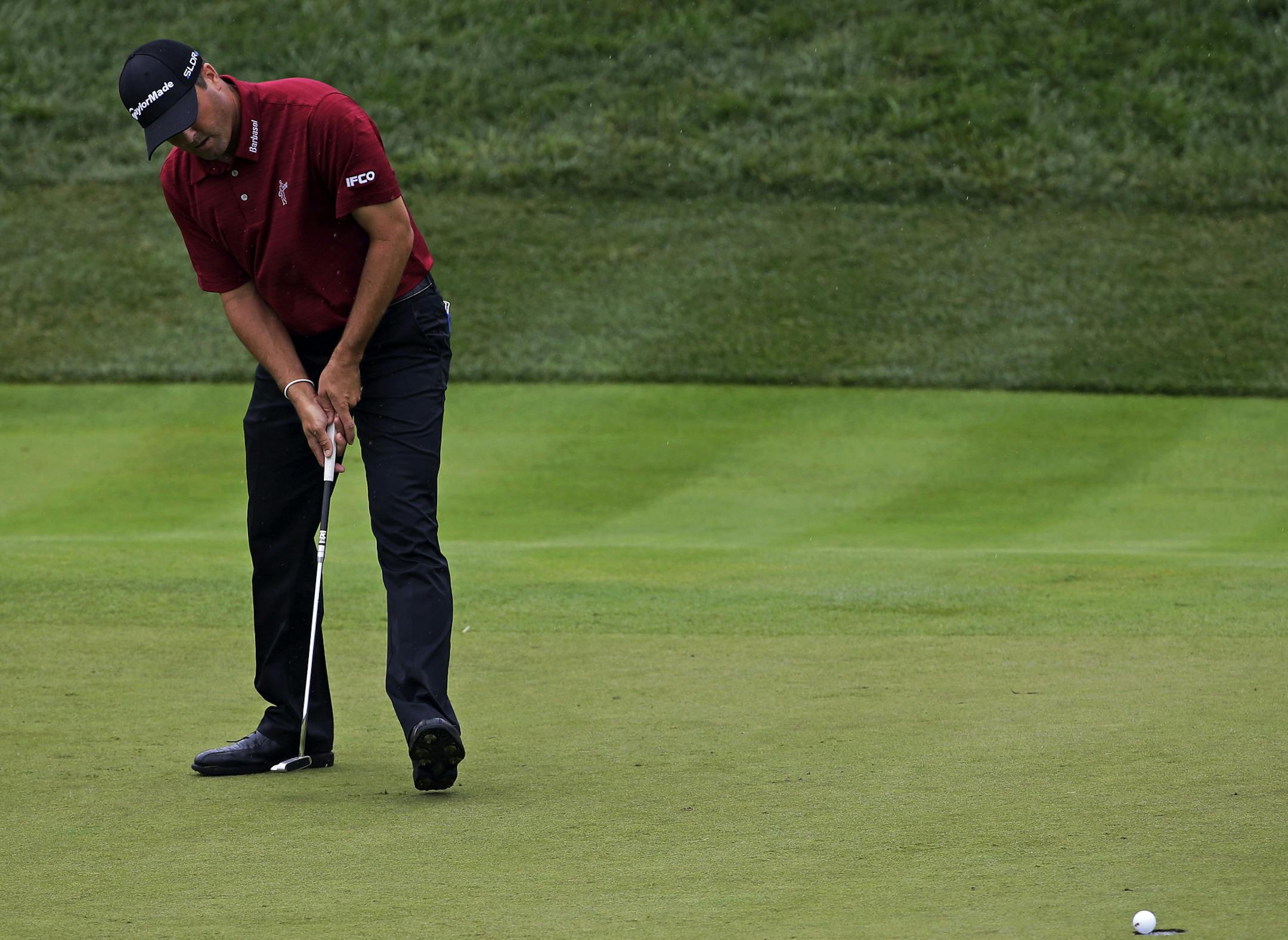 Ryan Palmer birdies the 17th hole during the second round of the PGA Championship golf tournament at Valhalla Golf Club on Friday, Aug. 8, 2014, in Louisville, Ky. (AP Photo/David J. Phillip)