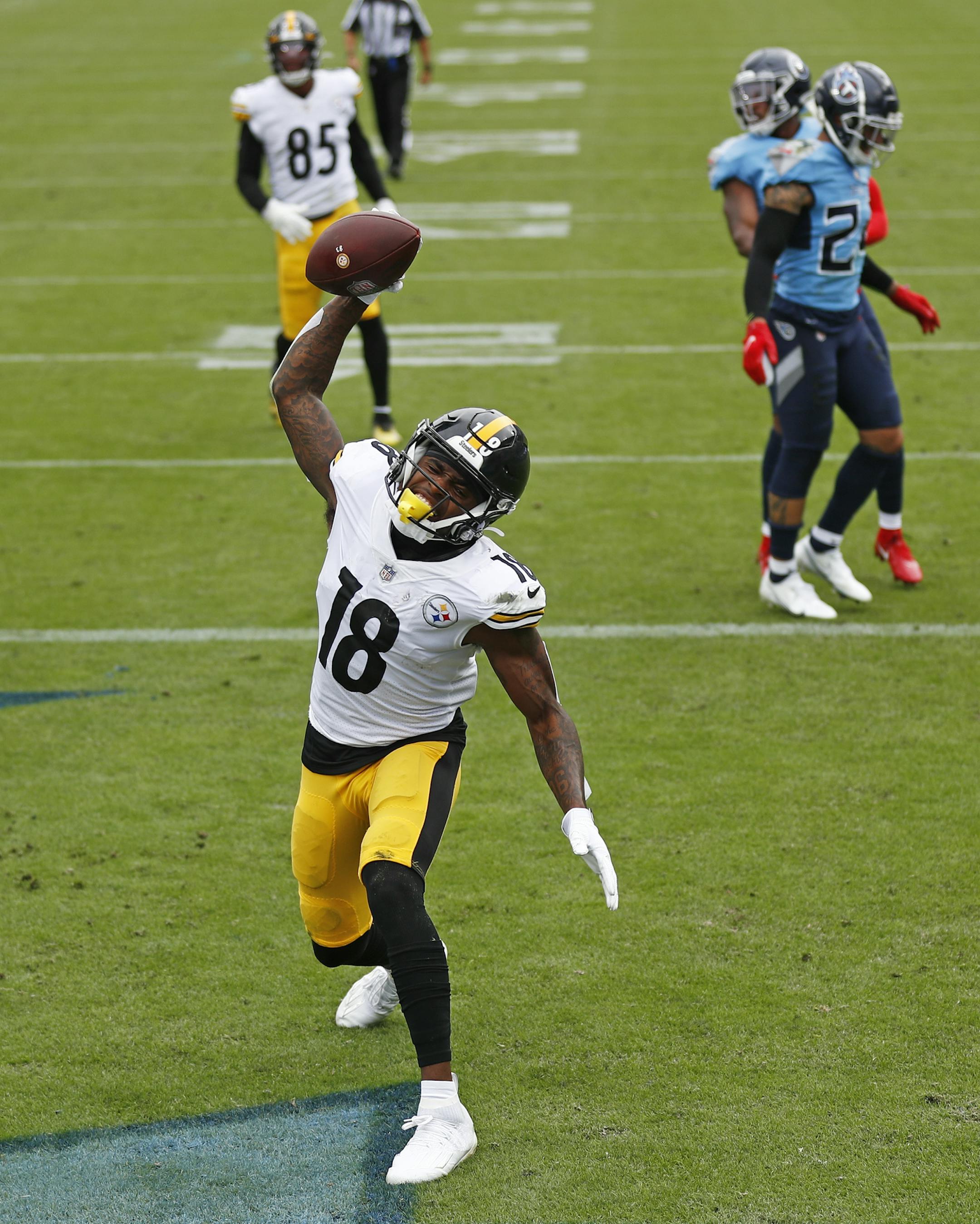 Pittsburgh Steelers wide receiver Diontae Johnson (18) celebrates after scoring a touchdown against the Tennessee Titans in the first half of an NFL football game Sunday, Oct. 25, 2020, in Nashville, Tenn. (AP Photo/Wade Payne)