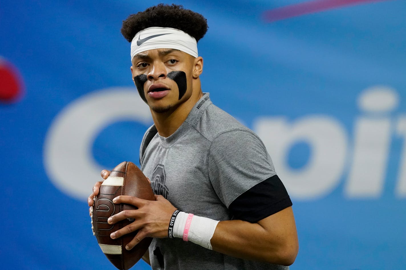 Ohio State quarterback Justin Fields warms up before the Sugar Bowl NCAA college football game against Clemson Friday, Jan. 1, 2021, in New Orleans. (AP Photo/John Bazemore)