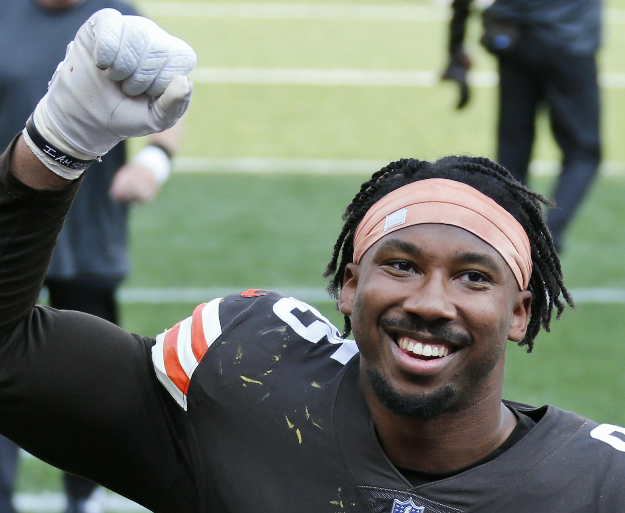 Cleveland Browns defensive end Myles Garrett celebrates after the Browns defeated the Washington Football Team in an NFL football game, Sunday, Sept. 27, 2020, in Cleveland. (AP Photo/Ron Schwane)
