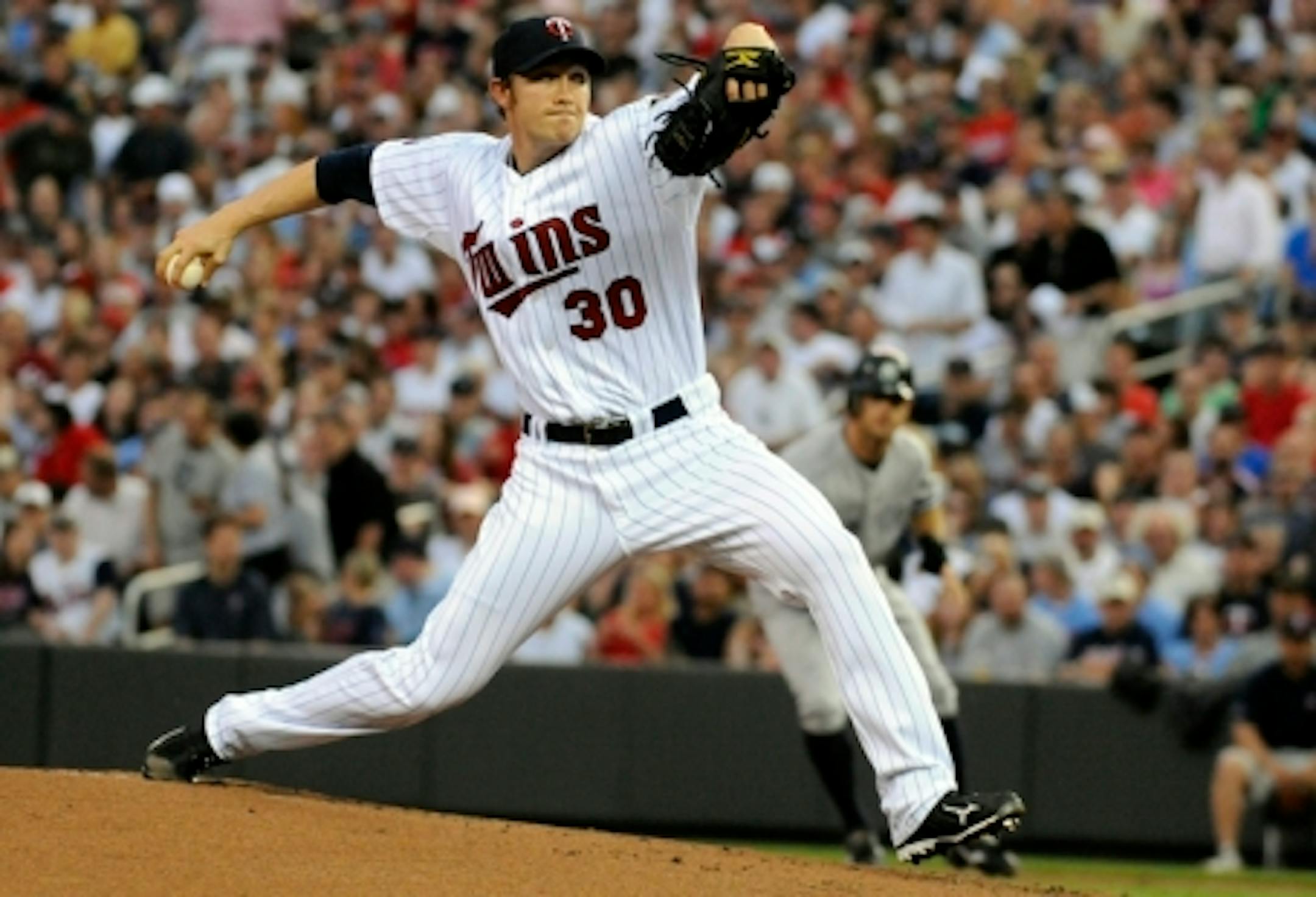 MINNEAPOLIS, MN - MAY 25: Scott Baker #30 of the Minnesota Twins pitches in the first inning against the New York Yankees during their game on May 25, 2010 at Target Field in Minneapolis, Minnesota. (Photo by Hannah Foslien /Getty Images)