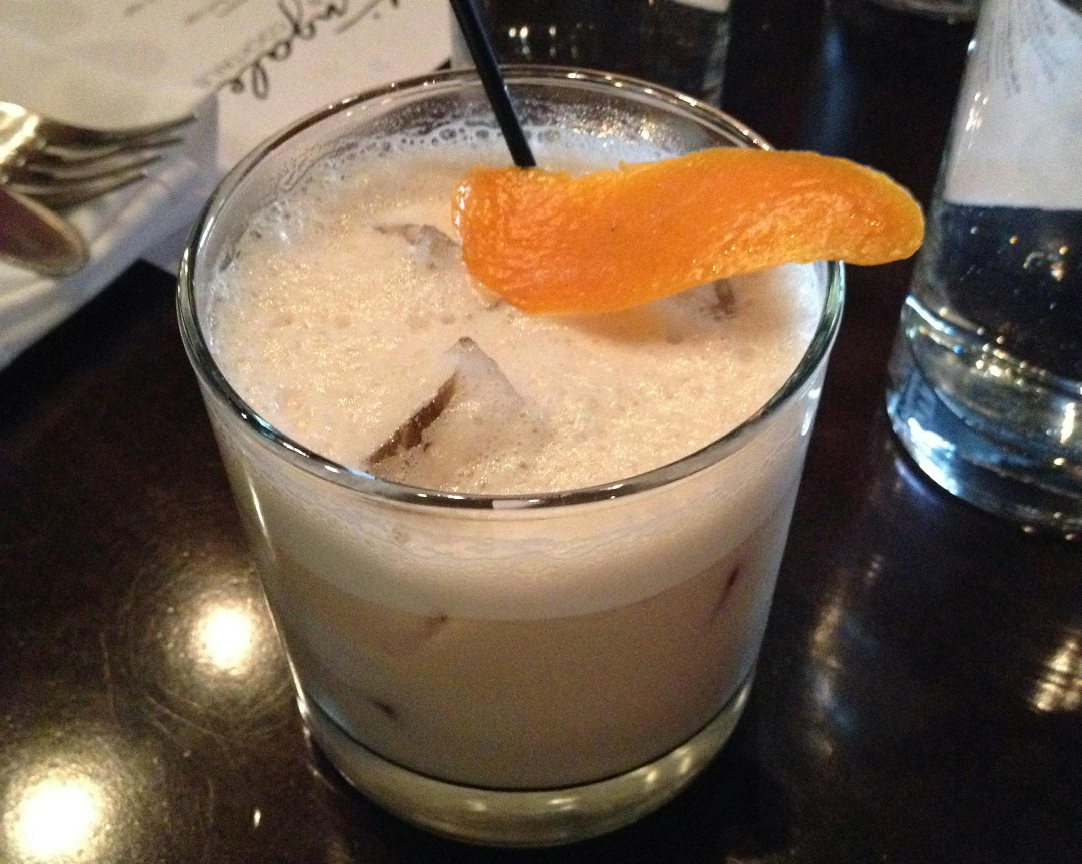 shots with the orange peel drink are of the Nightingale Milk Punch at (you guessed it) the Nightingale. ORG XMIT: MIN1502100919224478