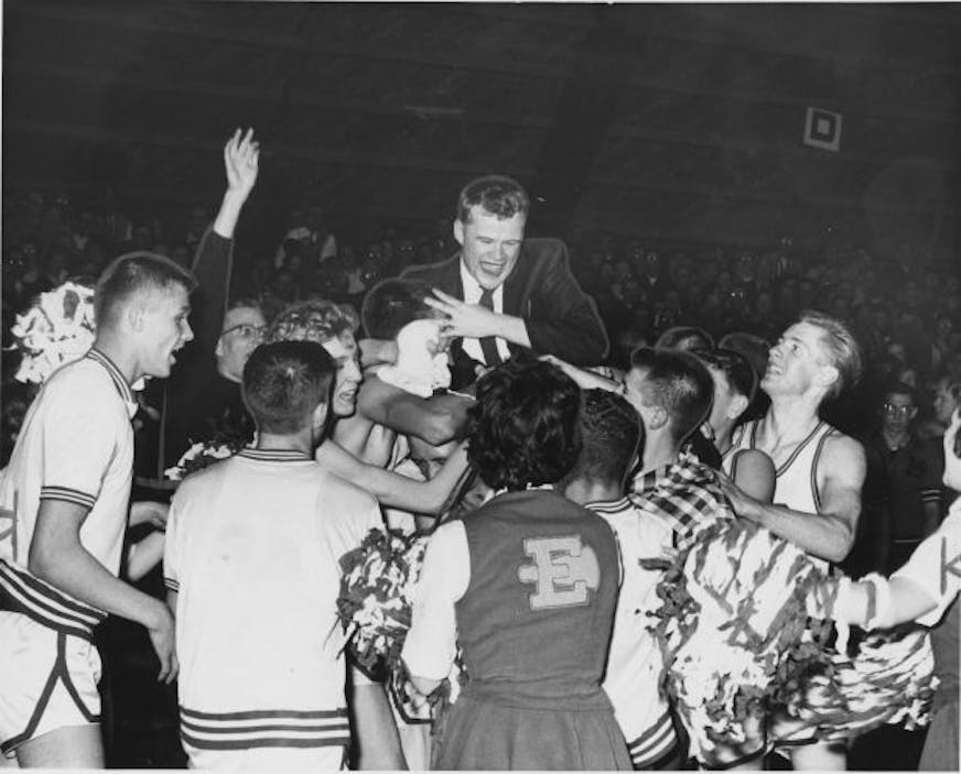 Edgerton basketball coach Rich Olson gets a victory ride after his team defeated Mountain Lake, Thursday March 17, 1960, sending Edgerton on to the state high school basketball tournament. Minneapolis STAR photo by Paul Siegel.