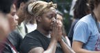 Demonstrators at a rally in front of the Governor's Residence, sparked by the shooting death of Philando Castile at the hands of police on Wednesday, 