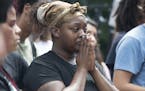 Demonstrators at a rally in front of the Governor's Residence, sparked by the shooting death of Philando Castile at the hands of police on Wednesday, 