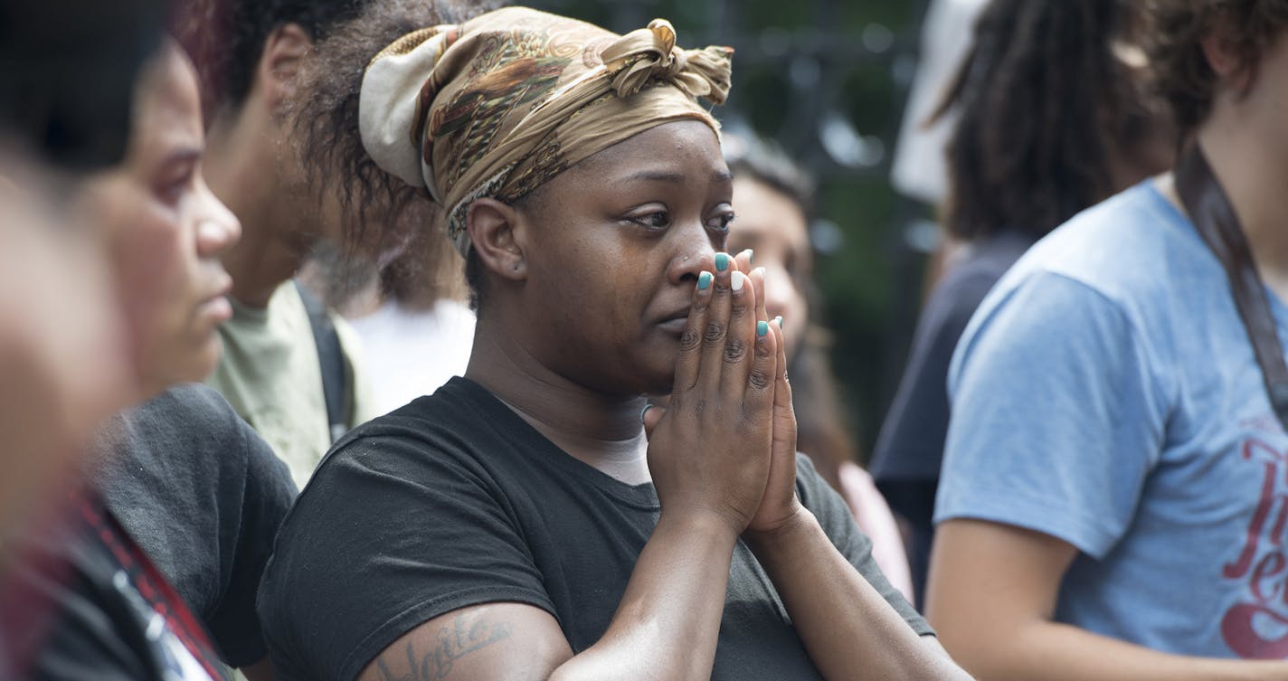 Demonstrators at a rally in front of the Governor's Residence, sparked by the shooting death of Philando Castile at the hands of police on Wednesday, in St. Paul, Minn., July 7, 2016. The aftermath of Castile's shooting, a black man, was live-streamed by his girlfriend, and shows Castile, who had been shot several times, slumping against her as she was recording the scene. (Angela Jimenez/The New York Times) ORG XMIT: MIN2016070818010356