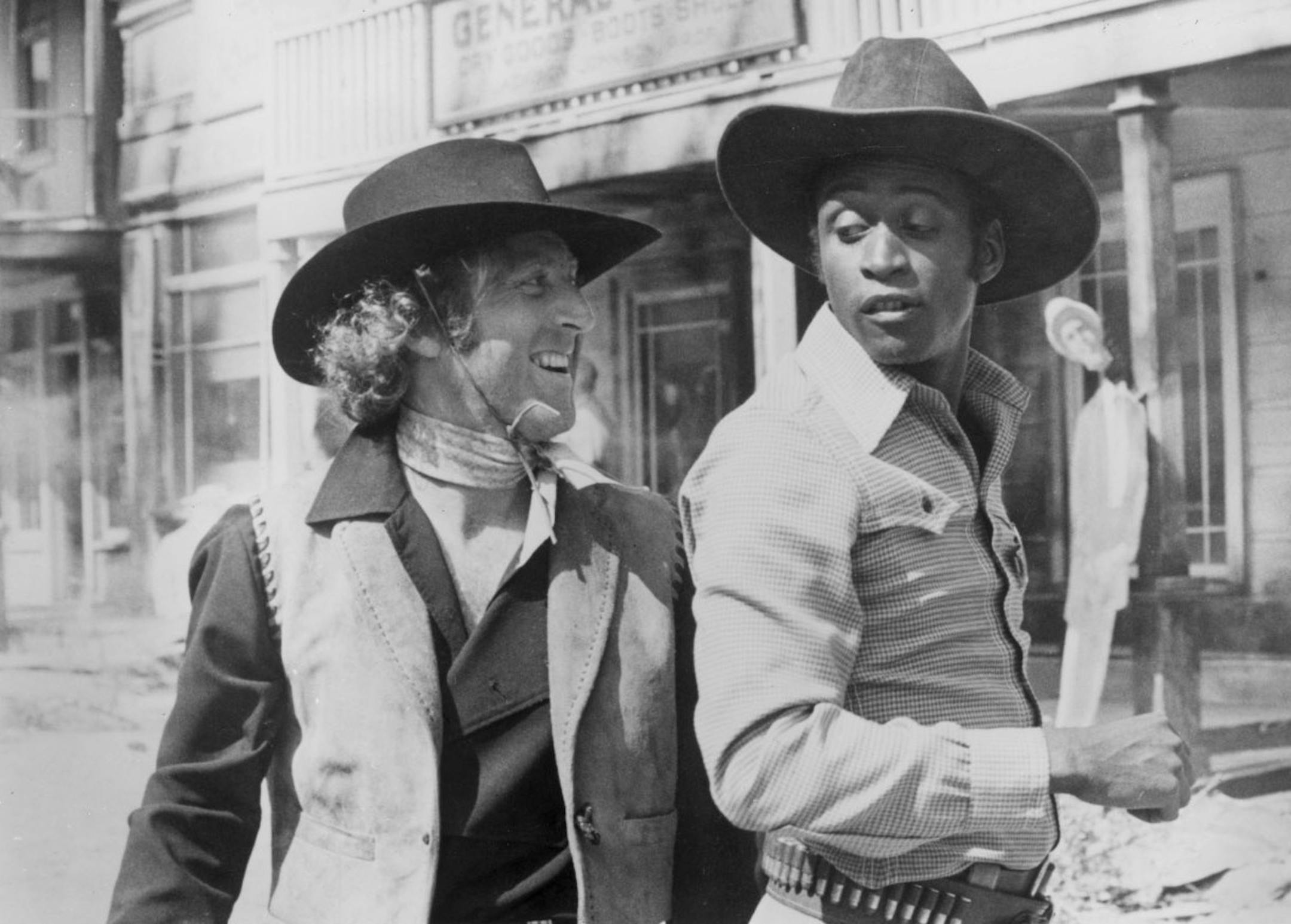 Gene Wilder (at left) and Clevon Little (right) star in the Western comedy movie classic "Blazing Saddles."