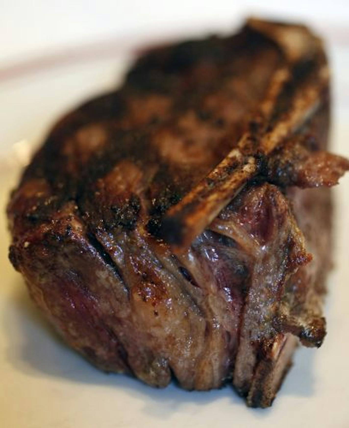 The bone-in filet is cooked to perfection.