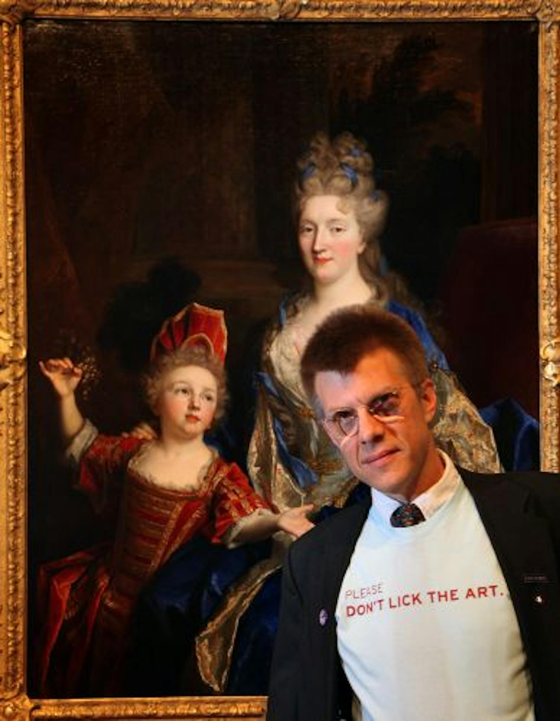 MIA guard Tim Piowtrowski posed with the painting licked by an overenthusiastic young visitor — and the T-shirt it spawned.