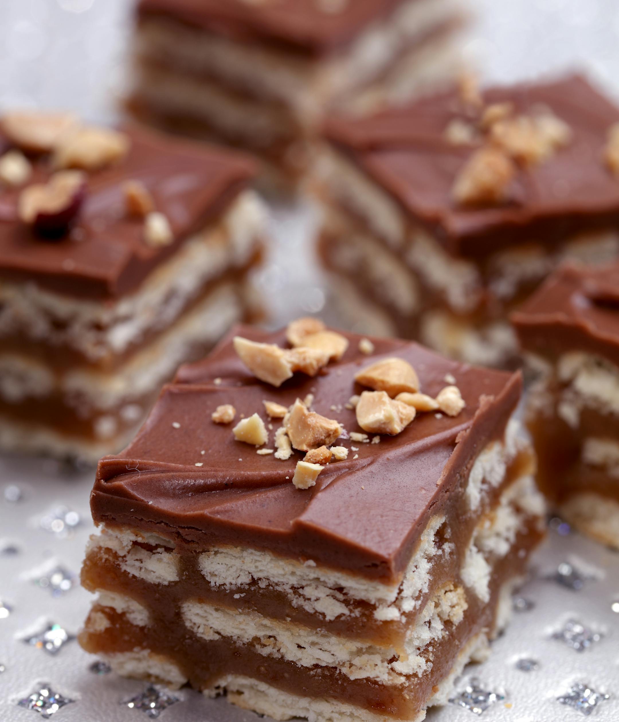 Kit Kat Christmas Bars (from baker Julie Olson) ] The winner and four finalists in the 2015 Taste Holiday Cookie (Cooky) Contest: Chocolate Decadence Cookies (from baker Elaine Prebonich), Kit Kat Christmas Bars (from baker Julie Olson), Cardamom Orange Zest Sugar Cookies (from baker Jeanne Nordstrom), Bacon Cornmeal Venetos (by bakers Julie Bollmann, Wendy Kleiser, Joan Koller, Geri Olson and Mary Urbas) and winner Apple Cardamom Pecan Star Cookies (from baker Jana Freiband).