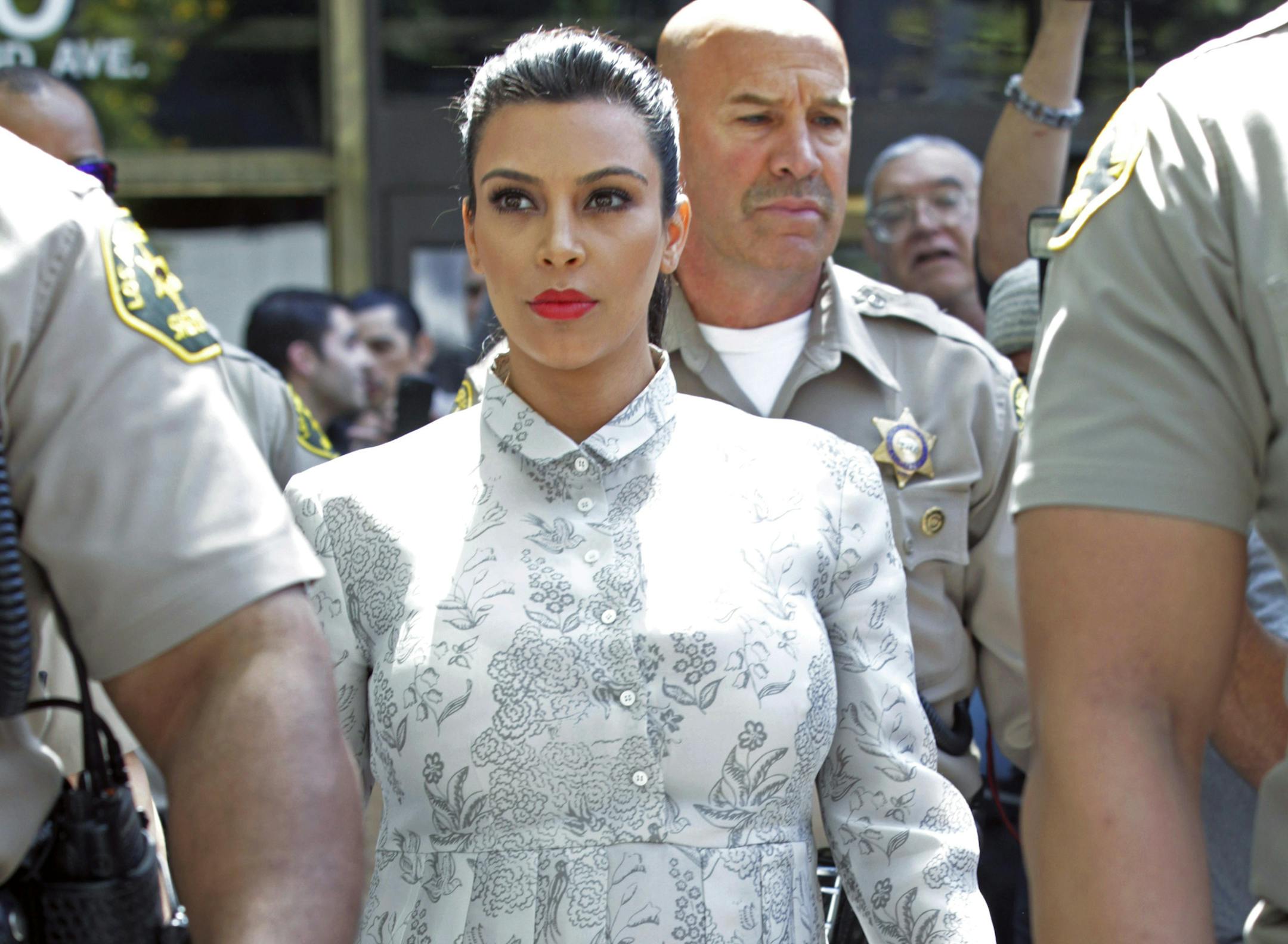 TV personality Kim Kardashian leaves Los Angeles County Superior Court after a hearing in her divorce from Kris Humphries, Friday, April 12, 2013. Humphries, a power forward for the Brooklyn Nets, did not attend the hearing. The reality star wants a divorce to end her 72-day marriage to Humphries, but the NBA player wants it annulled. He claims the marriage was based on fraud, but he would have to approve the allegation at trial. Humphries' attorneys declined to comment on settlement discussions