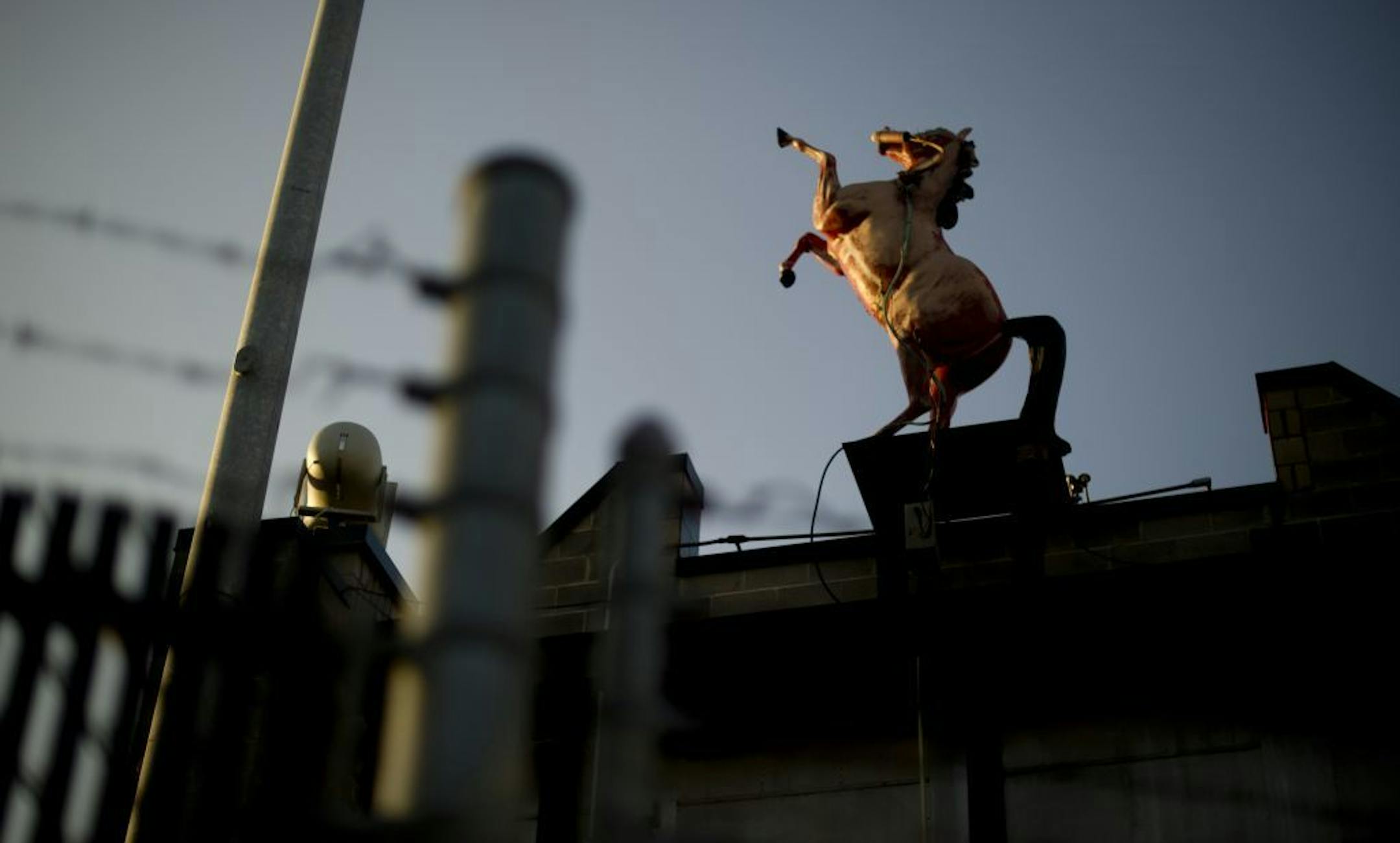 A sculpture of a rearing red stallion called Man O'War that shoots a six-foot flame from its mouth, marking each time the football team scores, inside Harding Stadium, at Steubenville High School in Steubenville, Ohio, Nov. 28, 2012. Football at Steubenville High School is an everyday topic, but rape charges against two players have some residents questioning the culture of football in the Ohio community.
