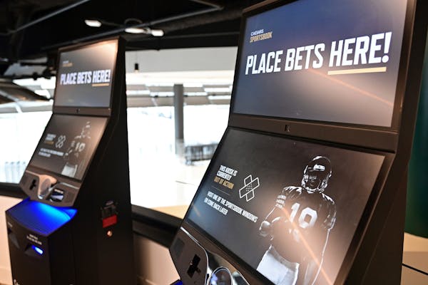 Betting kiosks are seen inside Caesars Sportsbook at Rocket Mortgage FieldHouse in Cleveland. Sports gambling became legal in Ohio on Jan. 1.