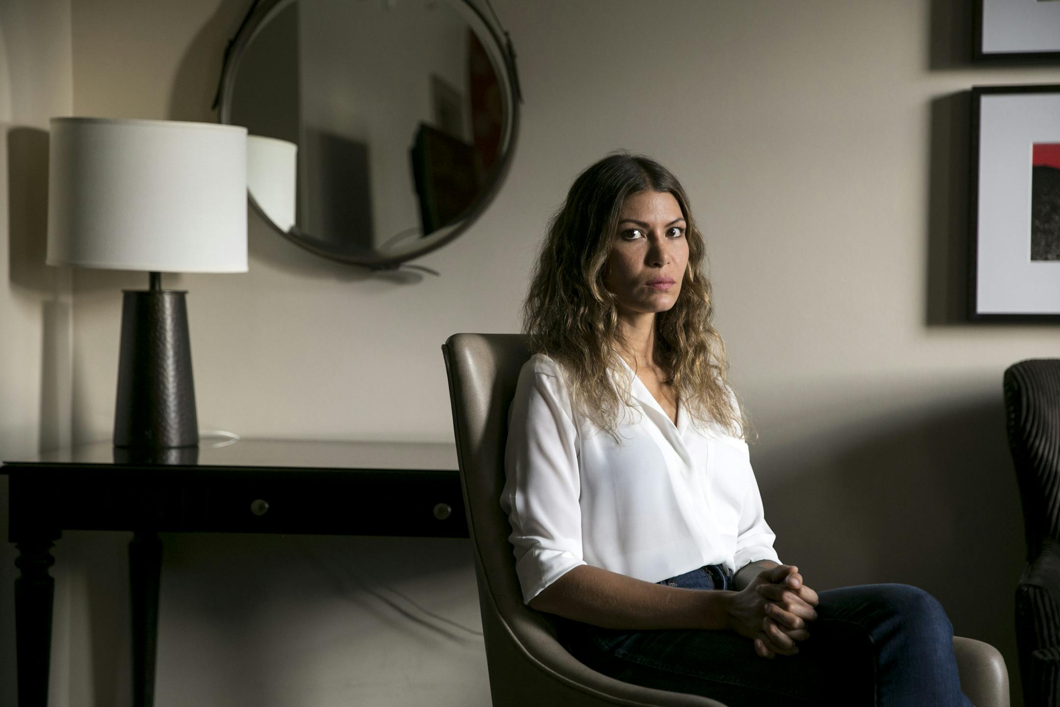 Actress Dawn Dunning in a hotel room in Austin, Texas, Oct. 8, 2017. Dunning and other actresses have come out to accuse the producer Harvey Weinstein of casting-couch abuses. After refusing a sexual advance, Dunning said in 2017, she was told by Weinstein: ìYouíll never make it in this business. This is how the business works.î (Ilana Panich-Linsman/The New York Times)